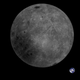 The Moon’s far side with the Earth in the background.